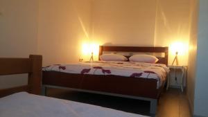 Postel nebo postele na pokoji v ubytování Chardak Apartment Sarajevo + 13 fotografií