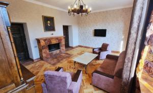 an overhead view of a living room with a fireplace at Via Gyumri in Gyumri
