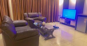 TV o dispositivi per l'intrattenimento presso Seven Days Hotel