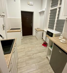 Kuchyňa alebo kuchynka v ubytovaní Apartament White