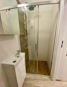 Kúpeľňa v ubytovaní Apartament White + 3 fotografie