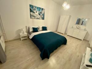 Posteľ alebo postele v izbe v ubytovaní Apartament White