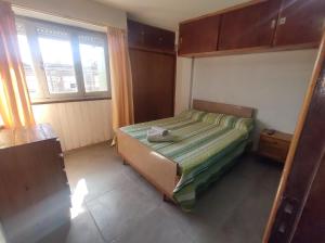 En eller flere senge i et værelse på A una cuadra de la playa con vista