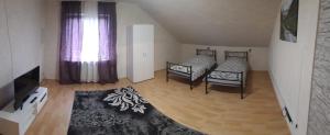 Katil atau katil-katil dalam bilik di Ferienwohnung in Erftstadt