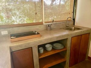 Afbeelding uit fotogalerij van La Buena Vida Cabinas in Playa Grande