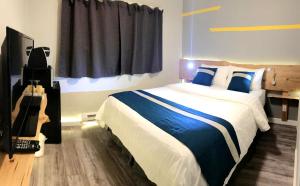 Postelja oz. postelje v sobi nastanitve Duncan Motel