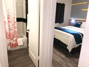 Postelja oz. postelje v sobi nastanitve Duncan Motel