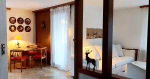 Postel nebo postele na pokoji v ubytování 2 rooms Appartment "Home, Swiss Home"