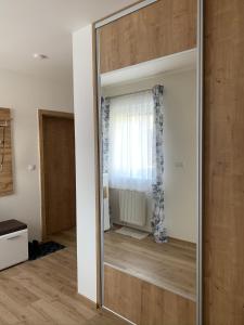 Postel nebo postele na pokoji v ubytování Apartmán s vyhlídkou