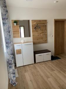 Kuchyň nebo kuchyňský kout v ubytování Apartmán s vyhlídkou