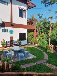 Zahrada ubytování หลับสบายที่ดอยตุง Zuh meh ja Home lodge