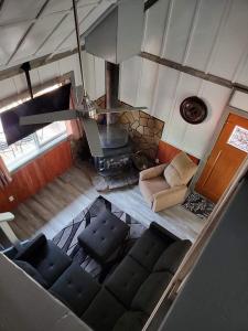 an overhead view of a living room with a stove at Greer Point Trails End Cabins in Greer