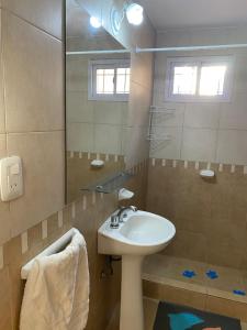 Koupelna v ubytování Centro Irigoyen + 16 fotografií