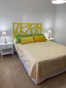 Postel nebo postele na pokoji v ubytování Centro Irigoyen