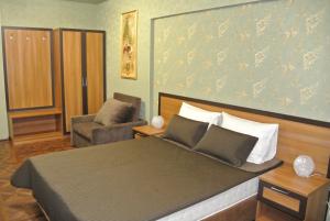  Кровать или кровати в номере Бутик-Отель Сургут 