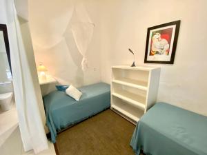 Postel nebo postele na pokoji v ubytování Mangueira Boutique Hotel Moreré