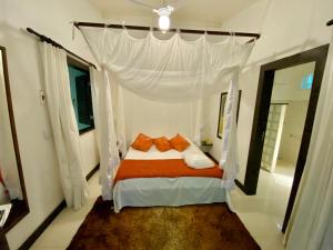 Postel nebo postele na pokoji v ubytování Mangueira Boutique Hotel Moreré