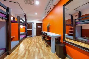 Postel nebo postele na pokoji v ubytování Kerton Hostel