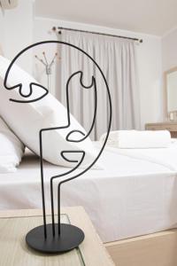 Posteľ alebo postele v izbe v ubytovaní SALTSEA BOUTIQUE VILLAS
