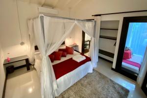 Postel nebo postele na pokoji v ubytování Mangueira Boutique Hotel Moreré