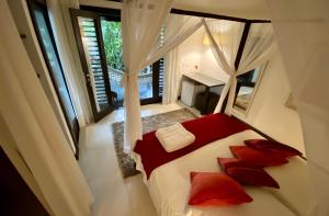 Postel nebo postele na pokoji v ubytování Mangueira Boutique Hotel Moreré