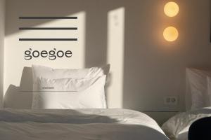 Postel nebo postele na pokoji v ubytování Shourin Hotel Cheonan by Aank