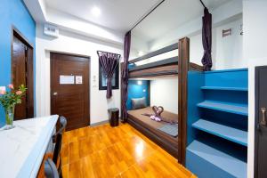 Postel nebo postele na pokoji v ubytování Kerton Hostel