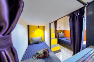Postel nebo postele na pokoji v ubytování Kerton Hostel
