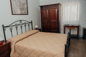 Posteľ alebo postele v izbe v ubytovaní La Casa dellAmericano - Casa d'epoca anni '30
