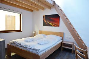 Postel nebo postele na pokoji v ubytování Ubytování Skipot