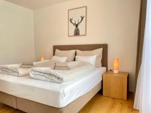 Posteľ alebo postele v izbe v ubytovaní die Tauplitz Lodges - Alm Lodge A8 by AA Holiday Homes