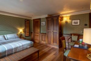 Postel nebo postele na pokoji v ubytování Hotel Montecarlo