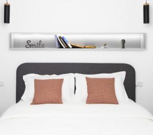 A bed or beds in a room at Andos Cozy & Luxury Upgraded Apartments