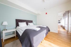 Postel nebo postele na pokoji v ubytování Continental Apartment Hotel Sollentuna