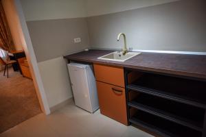 A kitchen or kitchenette at Schloss Apartments