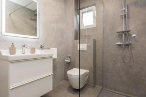 Kúpeľňa v ubytovaní Apartments Star - free private parking + 37 fotografií