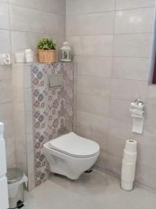 Kúpeľňa v ubytovaní Apartament Rojka