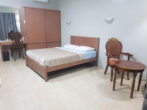 A bed or beds in a room at B&S pension house