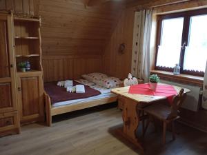 Posteľ alebo postele v izbe v ubytovaní Apartament Rojka