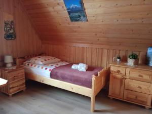Posteľ alebo postele v izbe v ubytovaní Apartament Rojka