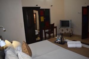Posteľ alebo postele v izbe v ubytovaní Hotel Nawal Sagar Palace - Bundi