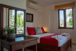 Postel nebo postele na pokoji v ubytování Turay Hotel