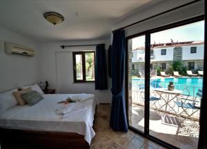 Postel nebo postele na pokoji v ubytování Turay Hotel