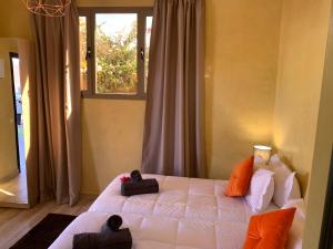 Postel nebo postele na pokoji v ubytování Villa Kesh Evasion Marrakech