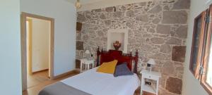 Posteľ alebo postele v izbe v ubytovaní Villa Canaria piscina jacuzzi jardín