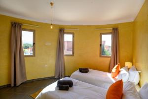 Postel nebo postele na pokoji v ubytování Villa Kesh Evasion Marrakech