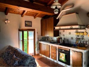 Kuchyňa alebo kuchynka v ubytovaní Agriturismo i Gessi
