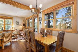a dining room with a wooden table and chairs at 8758 Trappers Crossing condo in Dillon