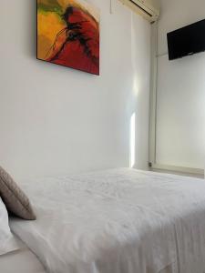 Letto o letti in una camera di Albergo Moderno