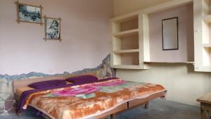 Letto o letti in una camera di White Rabbit Guest House
